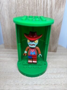 Green Minifigure Display Case with Cowboy Zombie Minifigure